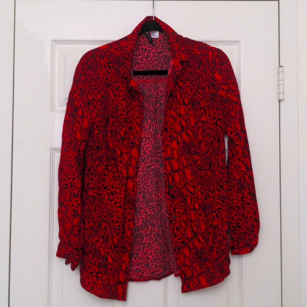 Bright red shirt with buttons and animal print, size 0